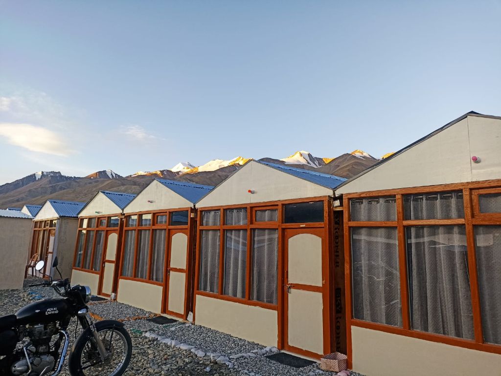 Royal Enfield at cottage sunset